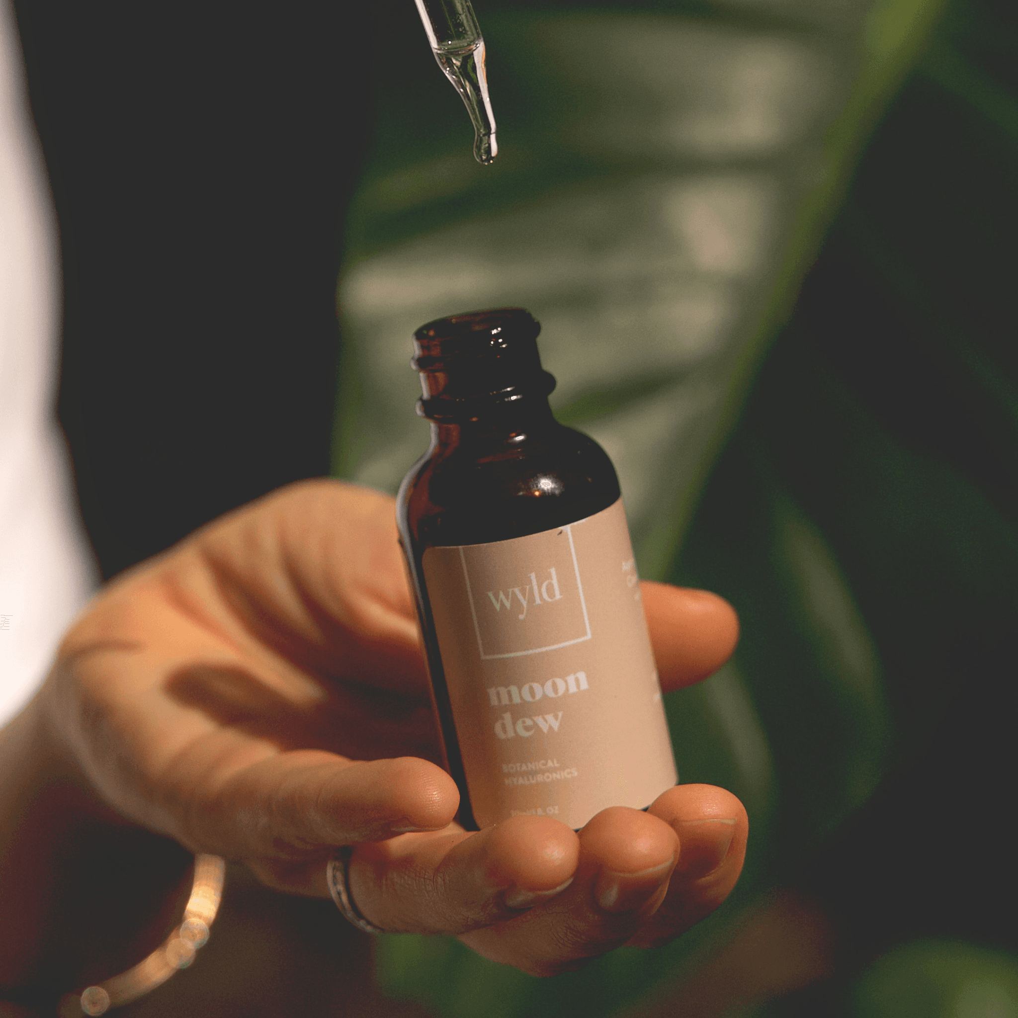 Moon Dew botanical serum bottle with dropper